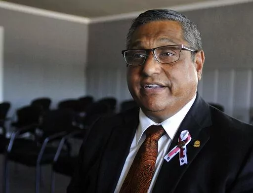 Gilbert Limones, one of the first targets of a gunman who killed 21 people at an elementary school, speaks during an interview at the church he pastors in Uvalde, Texas, on Sunday, June 5, 2022. Limones, who came under fire outside the funeral home where he works near the school, wasn't hurt and has since helped prepare some of the young victims for burial. (AP Photo/Jay Reeves)