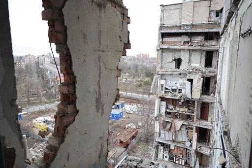 A view of an apartment building, damaged during a heavy fighting, in Mariupol, in Russian-controlled Donetsk region, eastern Ukraine, Thursday, Jan. 5, 2023. (AP Photo/Alexei Alexandrov)