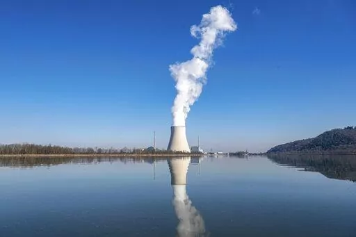 The nuclear power plant (NPP) Isar 2 is pictured in Essenbach, Germany, March 3, 2022. German Chancellor Olaf Scholz has ordered preparations for all of the country's three remaining nuclear reactors to continue operating until mid-April 2023. The move marks another hiccup in the country's long-running plan to end the use of atomic energy. (Armin Weigel/dpa via AP, File)