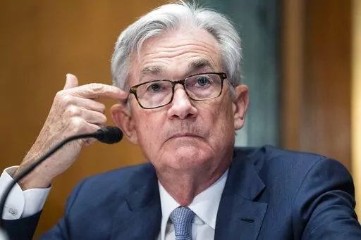Federal Reserve Chairman Jerome Powell testifies before the Senate Banking Committee hearing, Thursday, March 3, 2022 on Capitol Hill in Washington. Powell said Wednesday, March 23, that new forms of digital money such as cryptocurrencies and stablecoins present risks to the financial systems and will require new rules to protect consumers. (Tom Williams, Pool via AP, File)