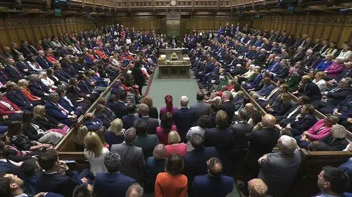 In this image taken from video lawmakers gather in the House of Commons, London, Tuesday July 9, 2024, as Parliament returned. Hundreds of newly elected lawmakers are gathering in Britain's Parliament after the election that brought a Labour government to power. Among the 650 members of the House of Commons, 335 are arriving for the first time. (House of Commons/UK Parliament via AP)