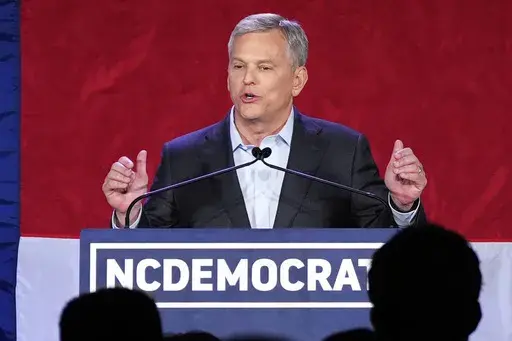 Democratic North Carolina gubernatorial candidate Attorney General Josh Stein speaks during an election night watch party, Tuesday, Nov. 5, 2024, in Raleigh, N.C. (AP Photo/Grant Halverson, File)