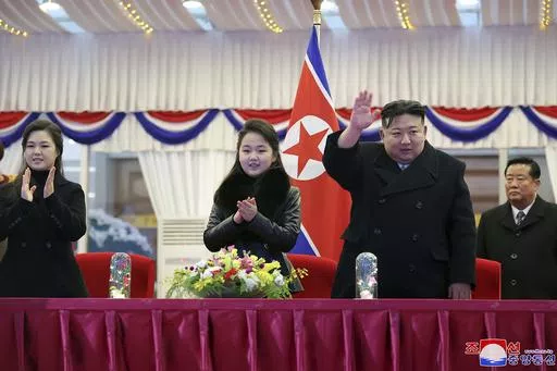 In this photo provided by the North Korean government, North Korean leader Kim Jong Un, second right, with his daughter and his wife Ri Sol Ju, left, attends a performance to celebrate the New Year in Pyongyang, North Korea, Sunday, Dec. 31, 2023. Independent journalists were not given access to cover the event depicted in this image distributed by the North Korean government. The content of this image is as provided and cannot be independently verified. Korean language watermark on image as pro