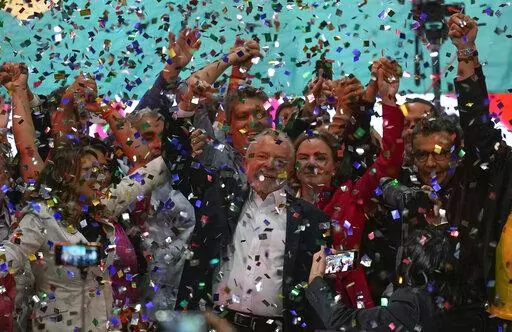 Confetti showers former Brazilian President Luiz Inacio Lula da Silva and supporters after the announcement of his candidacy for the country’s upcoming presidential election, in Sao Paulo, Brazil, Saturday, May 7, 2022. Brazil's general elections are scheduled for Oct. 2, 2022. (AP Photo/Andre Penner)