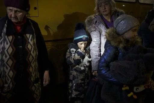 Internally displaced people from Mariupol and nearby towns arrive in Zaporizhzhia, Ukraine, Friday, April 1, 2022. (AP Photo/Felipe Dana)