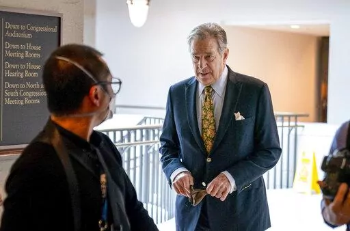 Paul Pelosi, right, the husband of House Speaker Nancy Pelosi, of California, follows his wife as she arrives for her weekly news conference on Capitol Hill in Washington, Thursday, March 17, 2022. Authorities say Paul Pelosi was arrested on suspicion of DUI in Northern California, late Saturday, May 28, 2022, in Napa County. He could face charges including driving under the influence. Bail was set at $5,000. (AP Photo/Andrew Harnik, File)