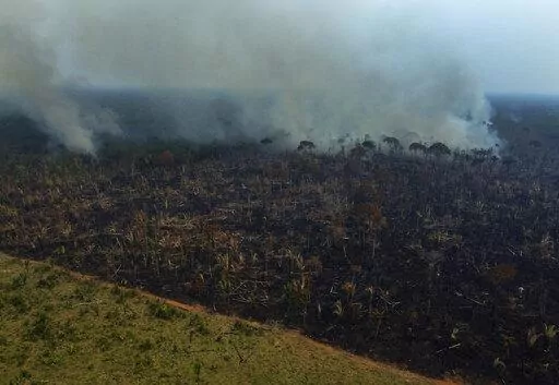Smoke rises from a forest fire in the Transamazonica highway region, in the municipality of Labrea, Amazonas state, Brazil, Sept. 17, 2022. Deforestation in the Brazilian Amazon slowed slightly last year, a year after a 15-year high, according to closely watched numbers published Wednesday, Nov. 30. (AP Photo/Edmar Barros, File)