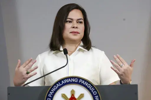 Philippine Vice President Sara Duterte gestures as she speaks during a press conference in Manila, Philippines on Friday, Feb. 7, 2025. (AP Photo/Basilio Sepe)
