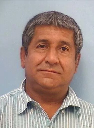 This photo released Tuesday, Aug. 9, 2022, by the Albuquerque Police Department shows Muhammad Syed. Syed, 51, was taken into custody Monday, Aug. 8, 2022, in connection with the killings of four Muslim men in Albuquerque, New Mexico, over the last nine months. He faces charges in two of the deaths and may be charged in the others. (Albuquerque Police Department via AP)