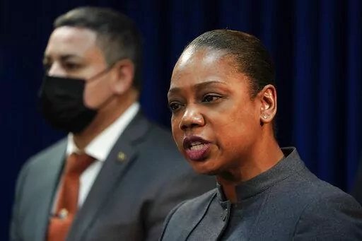 Police Commissioner Keechant Sewell speaks during a news conference after a gang bust in the Brooklyn borough of New York, Tuesday, Jan. 4, 2022. Sewell spent her entire policing career in suburban Long Island before recently becoming New York City's first police commissioner from outside the department in over two decades. (AP Photo/Seth Wenig)