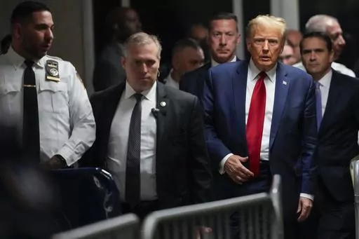 Former President Donald Trump leaves Manhattan criminal court, Feb. 15, 2024, in New York. Judge Juan Manuel Merchan agreed Friday, March 16, to delay former President Donald Trump’s hush-money criminal trial in New York until mid-April after his lawyers said they needed more time to sift through new evidence. (AP Photo/Mary Altaffer, File)