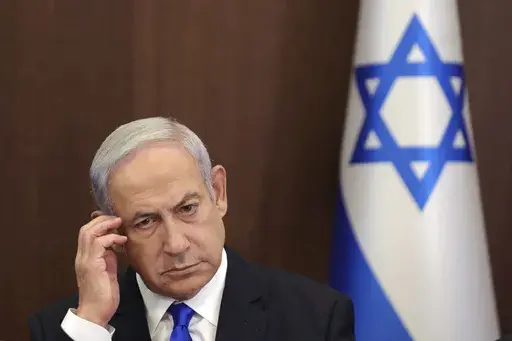 Israeli Prime Minister Benjamin Netanyahu attends the weekly cabinet meeting in the prime minister's office in Jerusalem, June 25, 2023. Prime Minister Benjamin Netanyahu’s office says the Israeli leader will undergo surgery on Sunday for a hernia. (Abir Sultan/Pool Photo via AP, File)