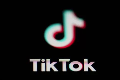 The icon for the video sharing TikTok app is seen on a smartphone, on Feb. 28, 2023. European regulators slapped TikTok with a $368 million fine on Friday, Sept. 15, 2023, for failing to protect children's privacy, the first time that the popular short video-sharing app has been punished for breaching Europe's strict data privacy rules. (AP Photo/Matt Slocum, File)