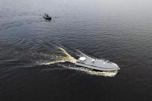 A sea drone cruises on the water during a presentation by Ukraine's Security Service in Kyiv region, Ukraine, on Tuesday, March 5, 2024. (AP Photo/Evgeniy Maloletka, File)