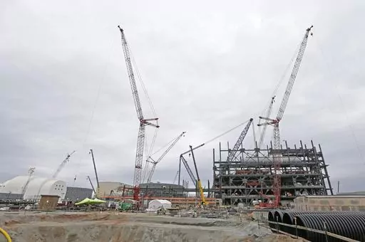 Construction is seen on two new nuclear reactors at the V.C. Summer Nuclear Station during a media tour in Jenkinsville, S.C., on Sept. 21, 2016. The owners abandoned the South Carolina reactors in 2017 after contractor Westinghouse Electric Co. declared bankruptcy, while construction continued on two new reactors in Georgia. (AP Photo/Chuck Burton, File)