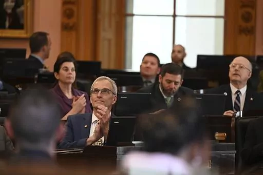 This image provided by the Ohio House Republican Caucus shows Rep. Dave Dobos, a Columbus-area Republican, sitting in the House chamber at the Ohio Statehouse in Columbus, Ohio on March 1, 2023. Dobos is under fire for falsely claiming for decades that he graduated from the Massachusetts Institute of Technology and has since stepped down from a House committee leadership post following the revelation. (Ohio House Republican Caucus via AP)