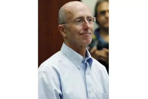In this file photo from May 22, 2014, Mark Mayfield appears in court in Madison, Miss. A federal appeals court ruled Wednesday, Aug. 23, 2023, that it would not revive a lawsuit that Mayfield's family filed in 2017 against the Madison mayor and others after Mayfield took his own life in June 2014 as he faced a conspiracy charge based on an accusation that he gave information to people who snuck into a nursing home and photographed the ailing wife of then-U.S. Sen. Thad Cochran. (AP Photo/Rogelio