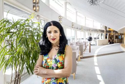 Swedish Parliamentarian Amineh Kakabaveh poses for a photo in Stockholm, Friday, June 10, 2022. When Turkey’s president rails against “terrorists” in the Swedish Parliament, Amineh Kakabaveh is convinced that he is talking about her. The former Kurdish rebel fighter turned Swedish lawmaker has a central role in the drama surrounding Sweden and Finland’s historic bid to join NATO, which Turkey opposes saying the Nordic countries are sheltering Kurdish militants.(Christine Olsson/TT via AP