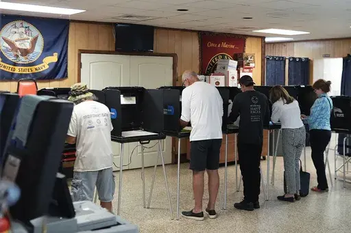 Voters fill in their ballots for Florida's primary election in South Miami, Fla., Aug. 20, 2024. (AP Photo/Rebecca Blackwell, File)
