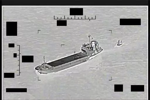 This photo released by the U.S. Navy shows the Iranian Revolutionary Guard ship Shahid Bazair, left, towing a U.S. Navy Saildrone Explorer in the Persian Gulf on Tuesday, Aug. 30, 2022. The U.S. Navy's Mideast-based 5th Fleet said Tuesday that Iran's paramilitary Revolutionary Guard seized and later let go of a U.S. sea drone in the Persian Gulf. Iran did not immediately acknowledge the incident, though it comes amid heightened tensions over Tehran's tattered nuclear deal with world powers. (U.S