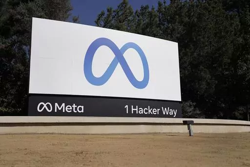 Facebook's Meta logo sign is seen at the company headquarters in Menlo Park, Calif., on, Oct. 28, 2021. Anyone in the U.S. who has had a Facebook account at any time since May 24, 2007, can now apply for their share of a $725 million privacy settlement that parent company Meta has agreed to pay. Meta is paying to settle a lawsuit alleging the world’s largest social media platform allowed millions of its users’ personal information to be fed to Cambridge Analytica, a firm that supported Donal