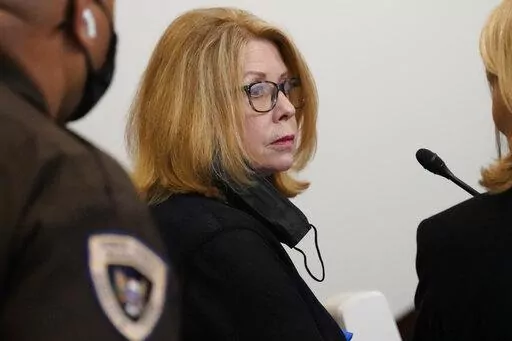 Nancy New, who with her son, Zachary, ran a private education company in Mississippi, pleaded guilty to state charges of misusing public money that was intended to help some of the poorest people in the nation, in Hinds County Circuit Court, Tuesday, April 26, 2022, in Jackson. (AP Photo/Rogelio V. Solis)