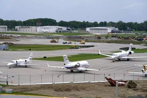 Planes sit on the tarmac at the Des Moines International Airport, Monday, June 13, 2022, in Des Moines, Iowa. With an eye on the upcoming July Fourth weekend, airlines are stepping up their criticism of federal officials over recent widespread flight delays and cancellations. The industry trade group Airlines for America said Friday, June 24, 2022, that understaffing at the Federal Aviation Administration is crippling traffic along the East Coast. (AP Photo/Charlie Neibergall, File)