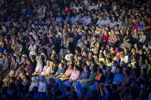Thousands gather during the National Eucharistic Congress opening ceremonies, July 17, 2024, at Lucas Oil Stadium in Indianapolis. (AP Photo/Doug McSchooler)