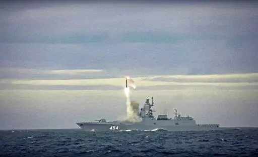 In this image taken from video released by Russian Defense Ministry Press Service on Saturday, May 28, 2022, a new Zircon hypersonic cruise missile is launched by the frigate Admiral Gorshkov of the Russian navy from the Barents Sea. Russia's Defense Ministry said the Russian navy successfully launched a new hypersonic missile from the Barents Sea. The ministry said the recently developed Zircon hypersonic cruise missile had struck its target about 1,000 kilometers away. (Russian Defense Ministr