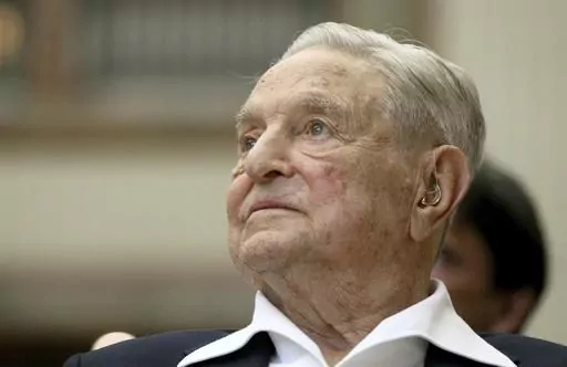 George Soros, founder and chairman of the Open Society Foundations, attends the Joseph A. Schumpeter Award ceremony in Vienna, Austria, June 21, 2019. As former President Donald Trump braces for a potential indictment related to hush money payments made on his behalf during his 2016 campaign, Republicans blasting the case as politically motivated are blaming a frequent target: Soros. (AP Photo/Ronald Zak, File)