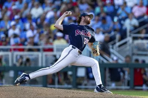 Mississippi starting pitcher Jack Dougherty throws against Oklahoma in the third inning during the first championship baseball game of the NCAA College World Series Saturday, June 25, 2022, in Omaha, Neb. (AP Photo/John Peterson)