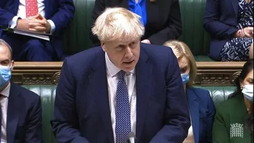 In this grab taken from video, Britain's Prime Minister Boris Johnson makes a statement ahead of Prime Minister's Questions in the House of Commons, London, Wednesday,  Jan. 12, 2022.  Johnson has apologized for attending a garden party during Britain’s coronavirus lockdown. He said Wednesday that there are things the government “did not get right.” Johnson is facing anger from public and politicians over claims he and his staff flouted pandemic restrictions by socializing when it was bann