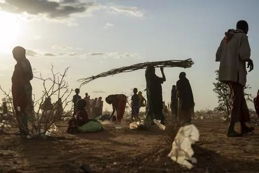 Somalis who have been displaced due to drought settle at a camp on the outskirts of Dollow, Somalia, Sept. 19, 2022. An international team of climate scientists says the ongoing drought in Eastern Africa has been made worse by human-induced climate change according to a report from World Weather Attribution. (AP Photo/Jerome Delay, File)