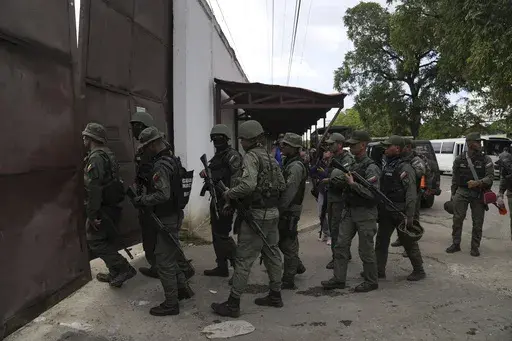 Soldiers raid the Tocorón Penitentiary Center, in Tocorón, Venezuela, Sept. 20, 2023. The Tren de Aragua gang originated at the prison. (AP Photo/Ariana Cubillos, File)