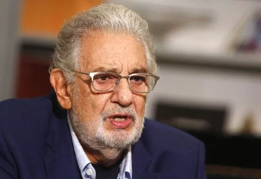Spanish tenor Placido Domingo gives an interview in Naples, Aug. 23, 2020. An Argentina-based yoga group is under investigation for sexually exploiting women to secure the support of wealthy and powerful men around the world, including the opera star Domingo, who hasn’t been accused of any crime. (AP Photo/Riccardo De Luca, File)