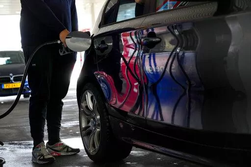 Motorists in the Netherlands headed to the pumps after a government reduction in duties on fuel entered into force to help motorists hit by soaring fuel prices, in Amsterdam, Netherlands, Friday, April 1, 2022. Inflation hit a new record for the 19 countries that use the euro as skyrocketing fuel prices boosted by the war in Ukraine add new burdens to household finances and weigh on a slowing economic recovery from the latest outbreaks of COVID-19, the European Union's statistics agency Eurostat