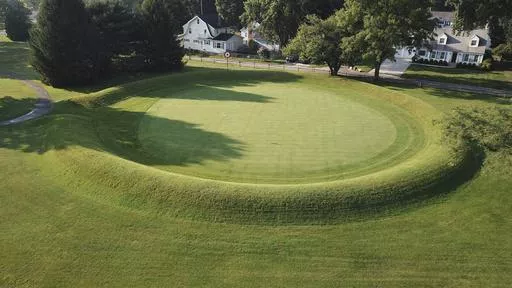 A 155-foot diameter circular enclosure around hole number 3 at Moundbuilders Country Club at the Octagon Earthworks in Newark, Ohio, is pictured July 30, 2019. A trial was slated to begin Tuesday, May 28, 2024, to determine how much the historical society must pay for the ancient ceremonial and burial earthworks, which is among eight ancient areas in the Hopewell Earthworks system named a World Heritage Site last year. (Doral Chenoweth III/The Columbus Dispatch via AP, File)