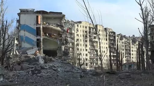 This photo taken from video released by the head of the Russian-controlled Donetsk region Denis Pushilin's telegram channel on Saturday, Feb. 24, 2024, shows damaged buildings, after Russian forces completed their takeover of Avdiivka, eastern Ukraine. Russian-controlled Donetsk region. (Head of the Russian-controlled Donetsk region Denis Pushilin telegram channel via AP)