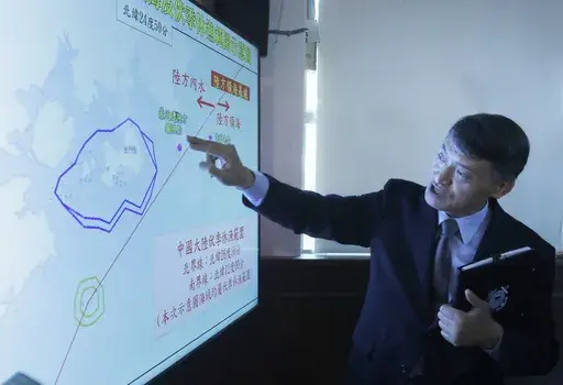 Coastal Control Division Chief Liao Yun-Hung talks about a fishing boat intercepted by Chinese vessels Tuesday night, during a news conference in Taipei, Taiwan, Wednesday, July 3, 2024. Taiwan is calling for the release of a fishing boat after it was boarded by China''s coast guard and steered to a port in mainland China on Tuesday. (AP Photo/Chiang Ying-ying)