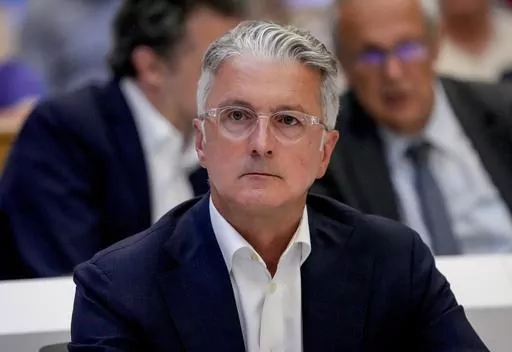 Rupert Stadler, former CEO of German car manufacturer Audi, sits in a regional court room and waits for the verdict in Munich, Germany, Tuesday, June 27, 2023. (AP Photo/Matthias Schrader, Pool)