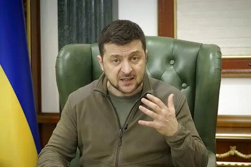 In this image from video provided by the Ukrainian Presidential Press Office and posted on Facebook early Saturday, March 12, 2022, Ukrainian President Volodymyr Zelenskyy speaks in Kyiv, Ukraine. (Ukrainian Presidential Press Office via AP)