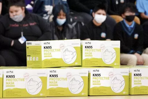 Boxes of KN95 protective masks are stacked together before being distributed to students at Camden High School in Camden, N.J., Wednesday, Feb. 9, 2022. According to a study by the Centers for Disease Control and Prevention released Tuesday, April 26, 2022,  three out of every four U.S. children have been infected with COVID-19. (AP Photo/Matt Rourke, File)