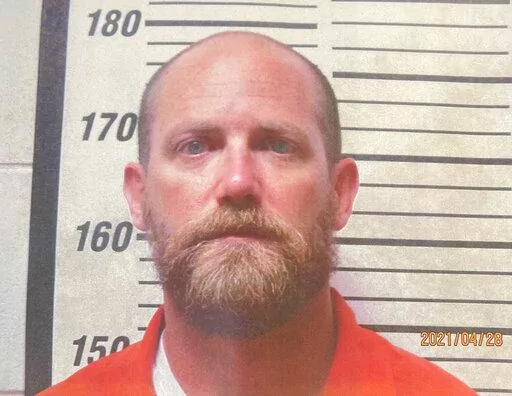 This April 28, 2021 booking photo provided by the Copiah County, Miss., Sheriff's Office shows DEA Agent Harold Duane Poole. Records obtained by The Associated Press raise new questions about how Poole avoided trial after he was charged with the murder of Chase Brewer and whether DEA brass overreached to protect one of their own amid a flurry of misconduct cases. (Copiah County Sheriff's Office via AP)