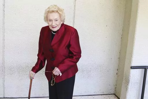 Native Hawaiian heiress Abigail Kawananakoa poses outside a Honolulu courthouse on Oct. 25, 2019. Kawananakoa, the so-called last Hawaiian princess whose lineage included the royal family that once ruled the islands and an Irish businessman who became one of Hawaii’s largest landowners, died on Sunday, Dec. 11, 2022. She was 96. (AP Photo/Jennifer Sinco Kelleher, File)