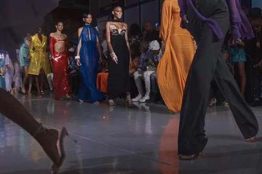 Fashion from designer LaQuan Smith's collection is modeled during Fashion Week on Monday, Sept. 12, 2022, in New York. (AP Photo/Andres Kudacki)
