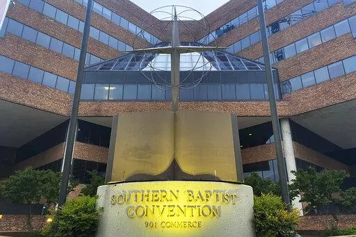 A cross and Bible sculpture stand outside the Southern Baptist Convention headquarters in Nashville, Tenn., May 24, 2022. On Tuesday, Sept. 20, 2022, the Southern Baptists' top administrative body voted to cut ties with two congregations: an LGBTQ-friendly church in North Carolina that had itself quit the denomination decades earlier and a New Jersey congregation it cited for “alleged discriminatory behavior.” (AP Photo/Holly Meyer, File)