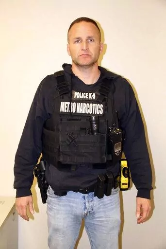 This March 13, 2020, photo provided by the Louisville Metro Police Department shows Officer Brett Hankison. A judge has denied a request from the legal team of Hankison, who took part in the deadly 2020 raid on Breonna Taylor’s home, to bar the media from part of his upcoming trial. But Jefferson Circuit Judge Ann Bailey Smith ruled Thursday, Jan. 27, 2022, that the media can’t bring cameras into the courtroom while individual prospective jurors are questioned ahead of the trial. (Louisville