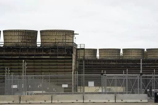Cooling towers release heat generated by boiling water reactors at Xcel Energy's Nuclear Generating Plant on Oct. 2, 2019, in Monticello, Minn. Minnesota regulators said Thursday, March 16, 2023, that they're monitoring the cleanup of a leak of 400,000 gallons of radioactive water from Xcel Energy's Monticello nuclear power plant in late November 2022. The company said there's no danger to the public. (Evan Frost/Minnesota Public Radio via AP, File)
