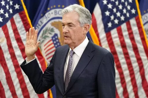 Federal Reserve Board Chair Jerome Powell takes the oath of office for his second term, Monday, May 23, 2022, in Washington. (AP Photo/Patrick Semansky)