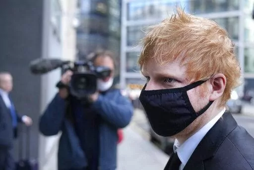 Musician Ed Sheeran arrives at the Rolls Building, High Court in central London, on March 15, 2022. Grammy Award-winning songwriter Ed Sheeran has won Wednesday, April 6, 2022, a U.K. copyright battle over the 2017 hit “Shape of You.’’ (AP Photo/Frank Augstein)